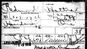 Scanned image of Hattie Redmond's voter card from 1912. Data includes first and last names, address, occupation, place of nativity, age, number of years in Oregon, party affiliation, precinct name of administrative personnel, and signatures. 