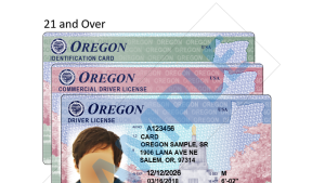 Three examples of Real ID documents layered in a staggered fashion over one another. The faces on the Real IDs are blurred out.