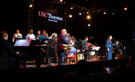 Students perform onstage at an ALAJE concert.