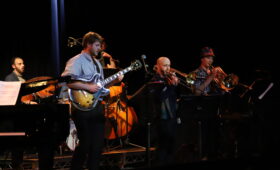 Jazz students perform onstage.