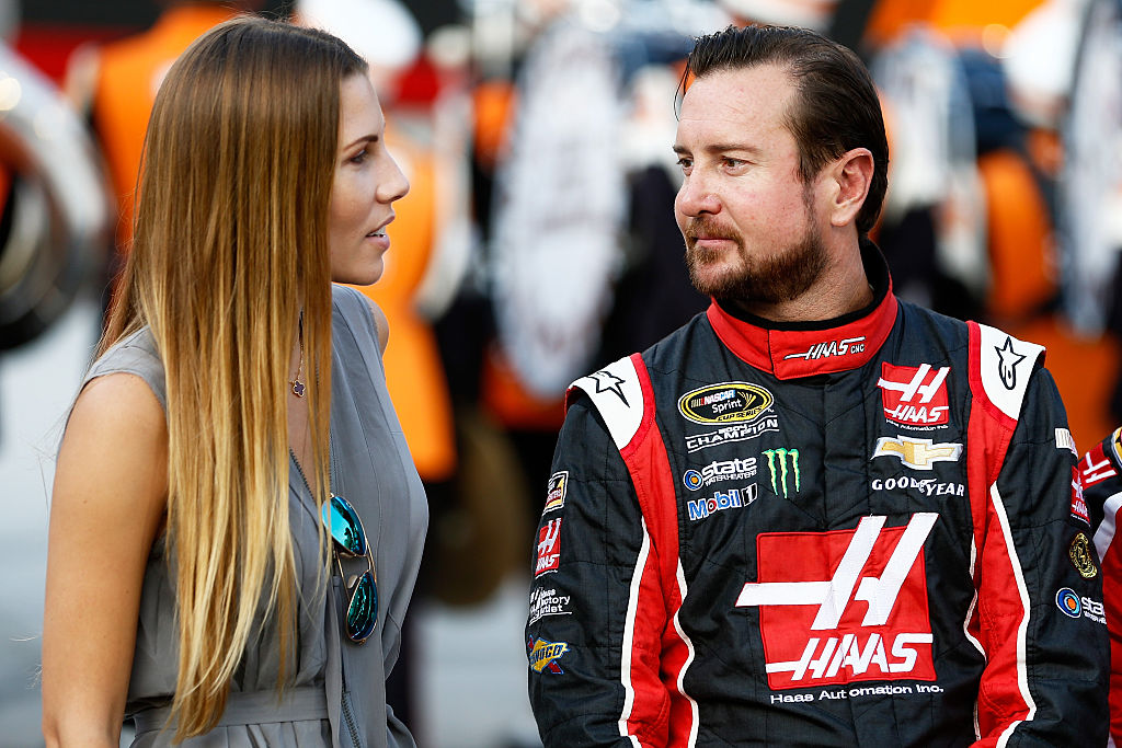 BRISTOL, TN - AUGUST 22: Kurt Busch, driver of the #41 Haas Automation Chevrolet, talks to his girlfriend, Ashley Van Metre, prior to the NASCAR Sprint Cup Series IRWIN Tools Night Race at Bristol Motor Speedway on August 22, 2015 in Bristol, Tennessee. (Photo by Jeff Zelevansky/Getty Images)