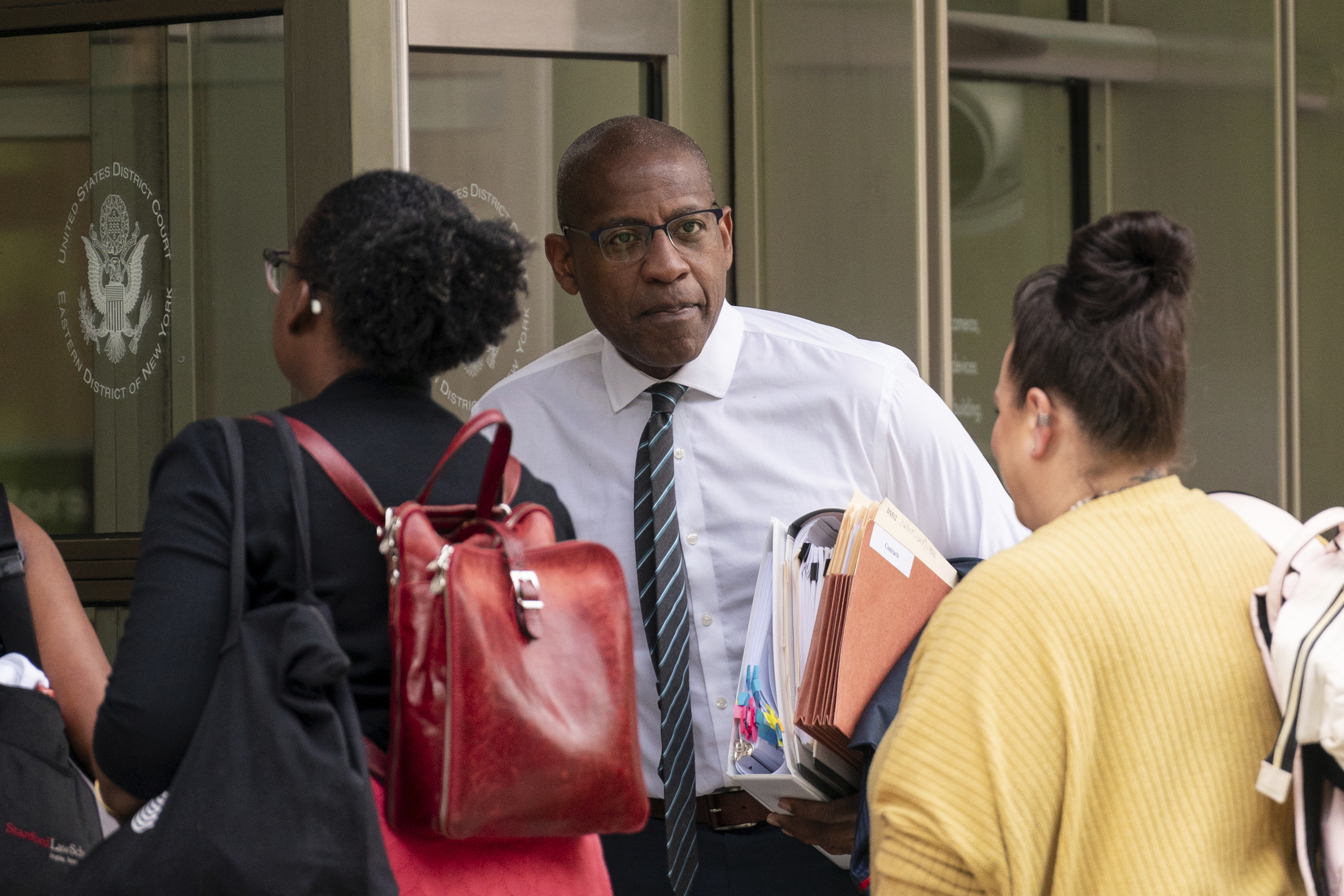 FILE - CEO and co-founder of Ozy Media Carlos Watson arrives at Brooklyn Federal Court, June 7, 2024 in New York. Watson began testifying trial in the federal criminal trial surrounding the collapse of his Ozy Media. (AP Photo/Adam Gray, file)