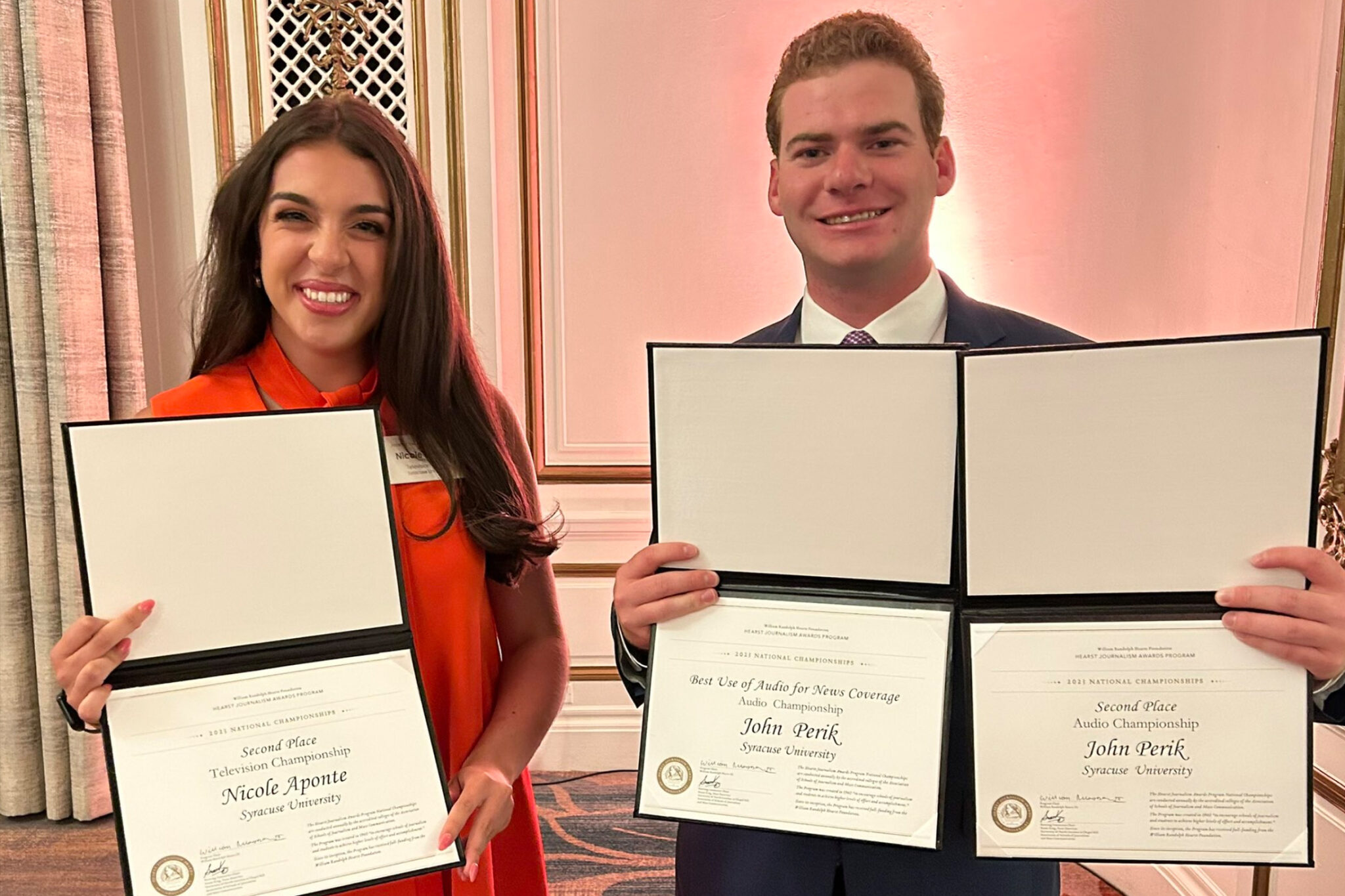 Nicole Aponte (left) and John Perik display their awards at the 2023 Hearst National Championships.