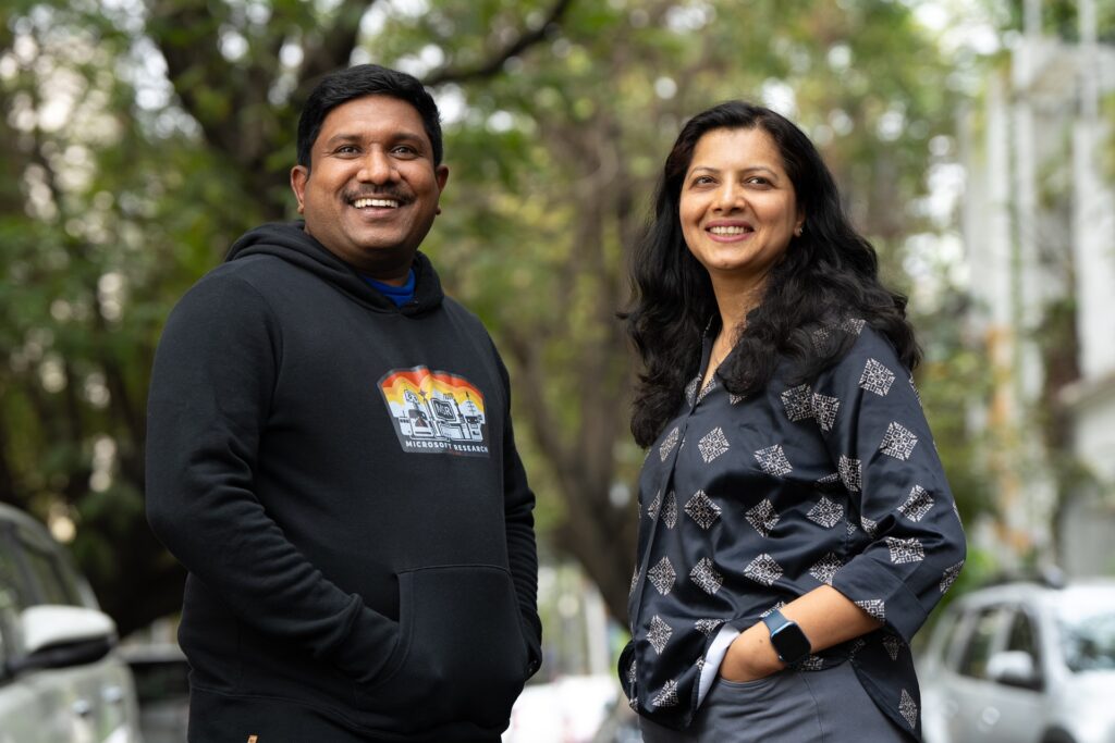 Outdoor portrait of a male and female researcher next to each other