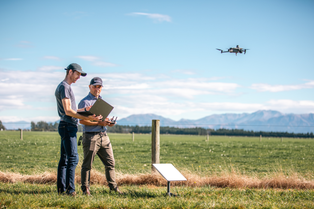 Men operating a drone