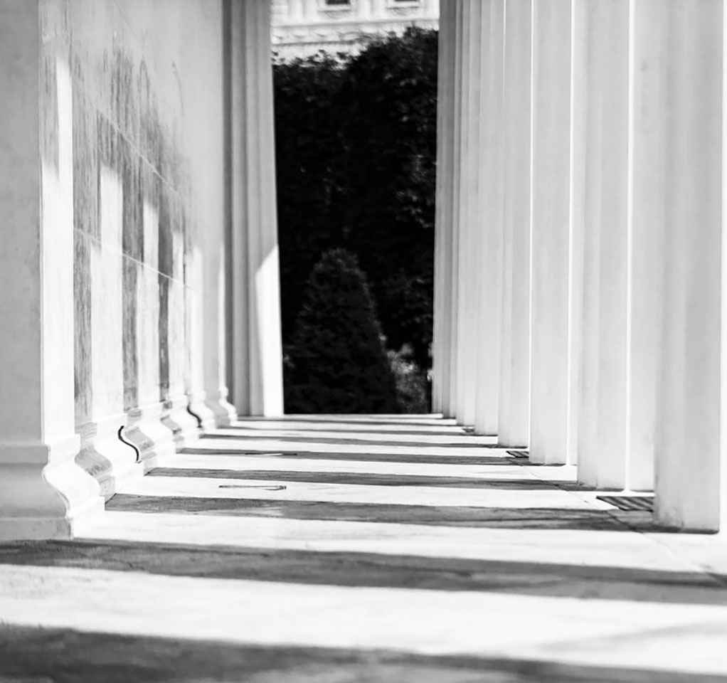 An abstract view through pillars at a courthouse