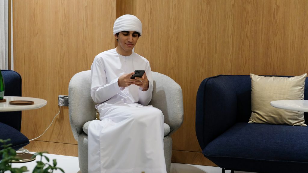 Young man using his smartphone.