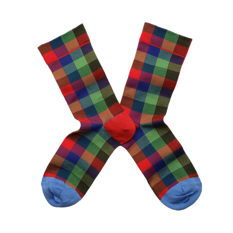 Green, red and blue chequered socks with a red ankle and a blue toe.