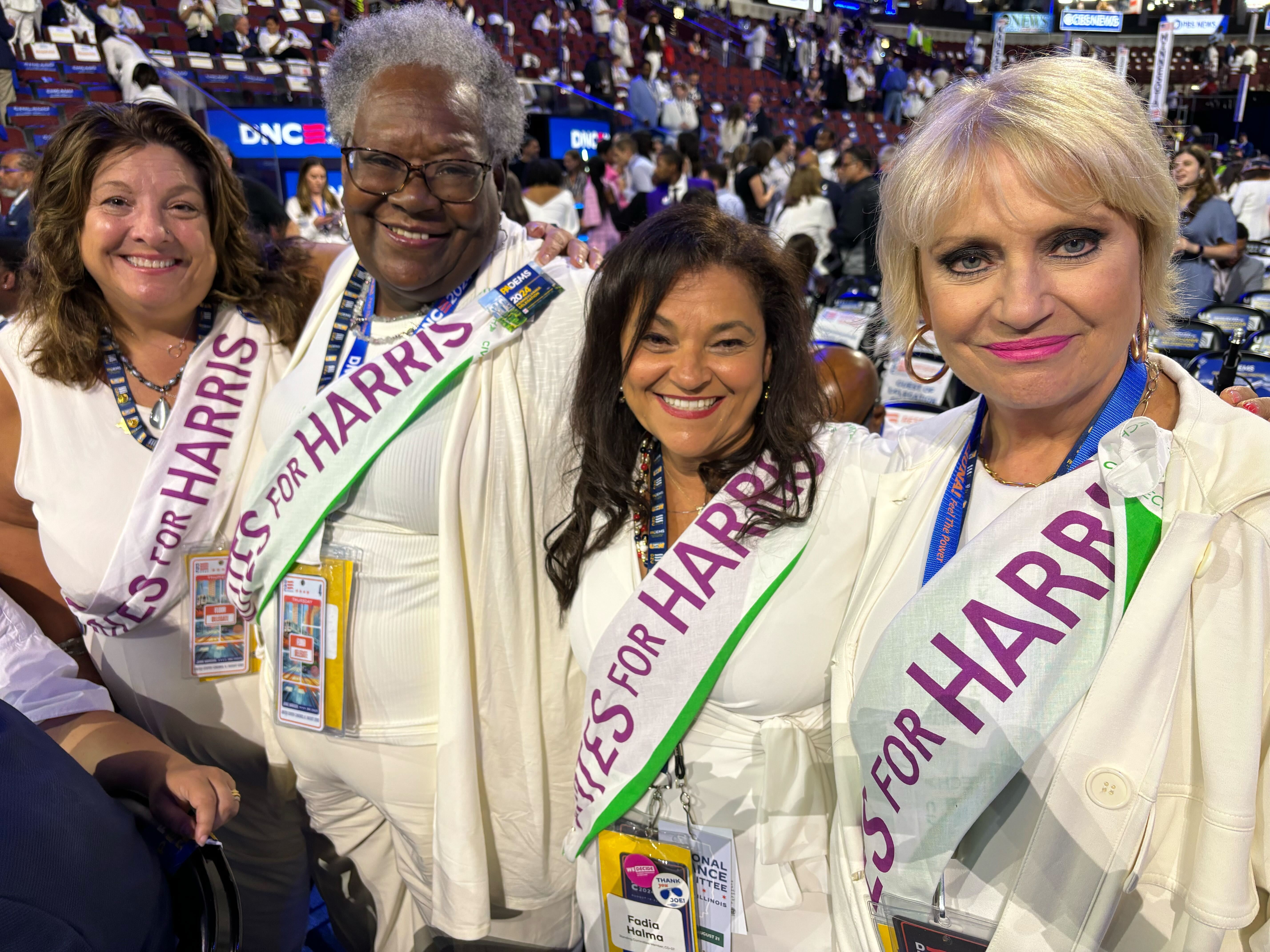 Lori Hefner-Vargo, Carmen Bell, Fadia Halma and Lori McFarland from Pennsylvania's Lehigh County wore white and made sashes as a sign of respect for Vice President Harris.