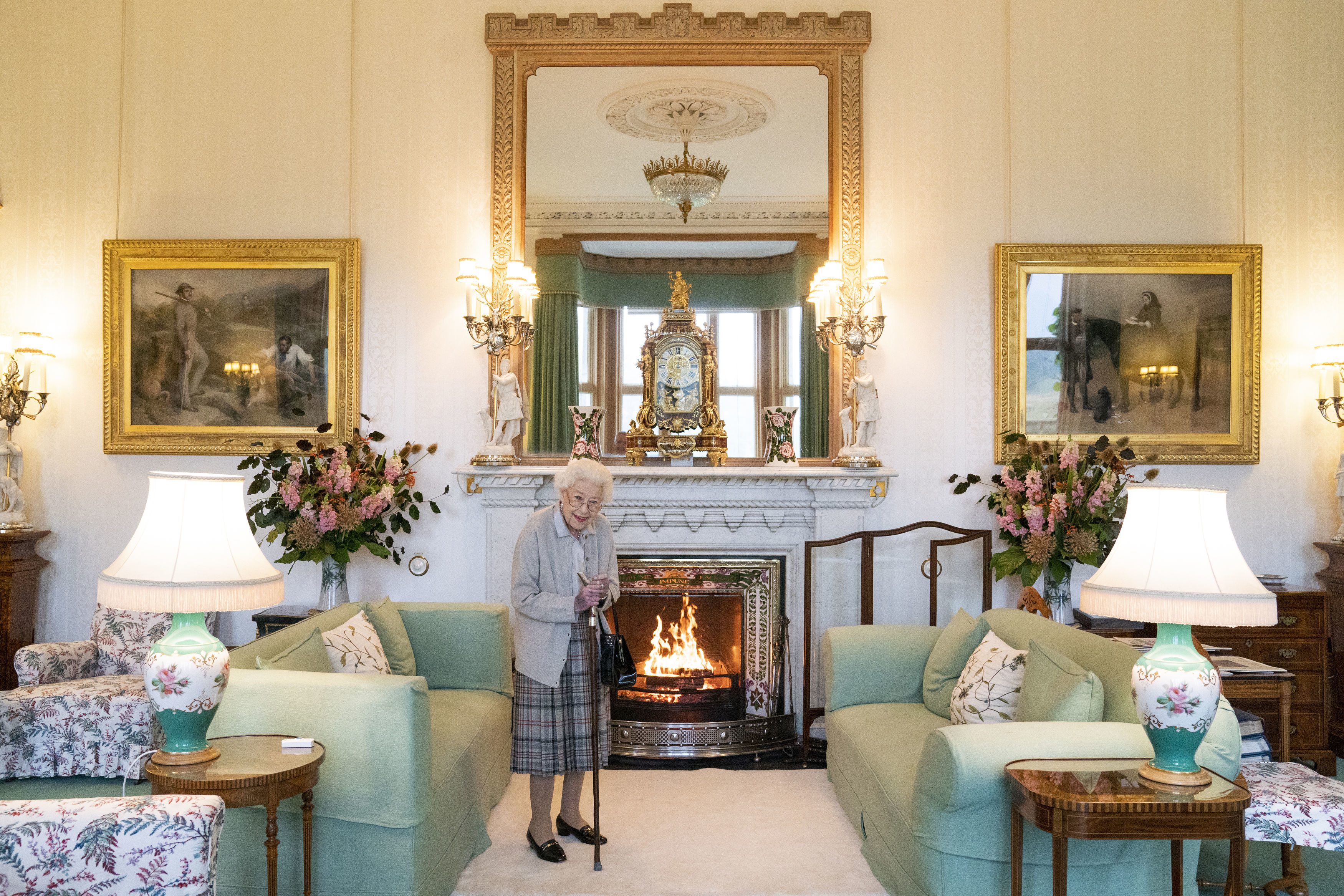 Queen Elizabeth II waits in the Drawing Room before receiving newly elected leader of the Conservative party Liz Truss at Balmoral Castle on Sept. 6.