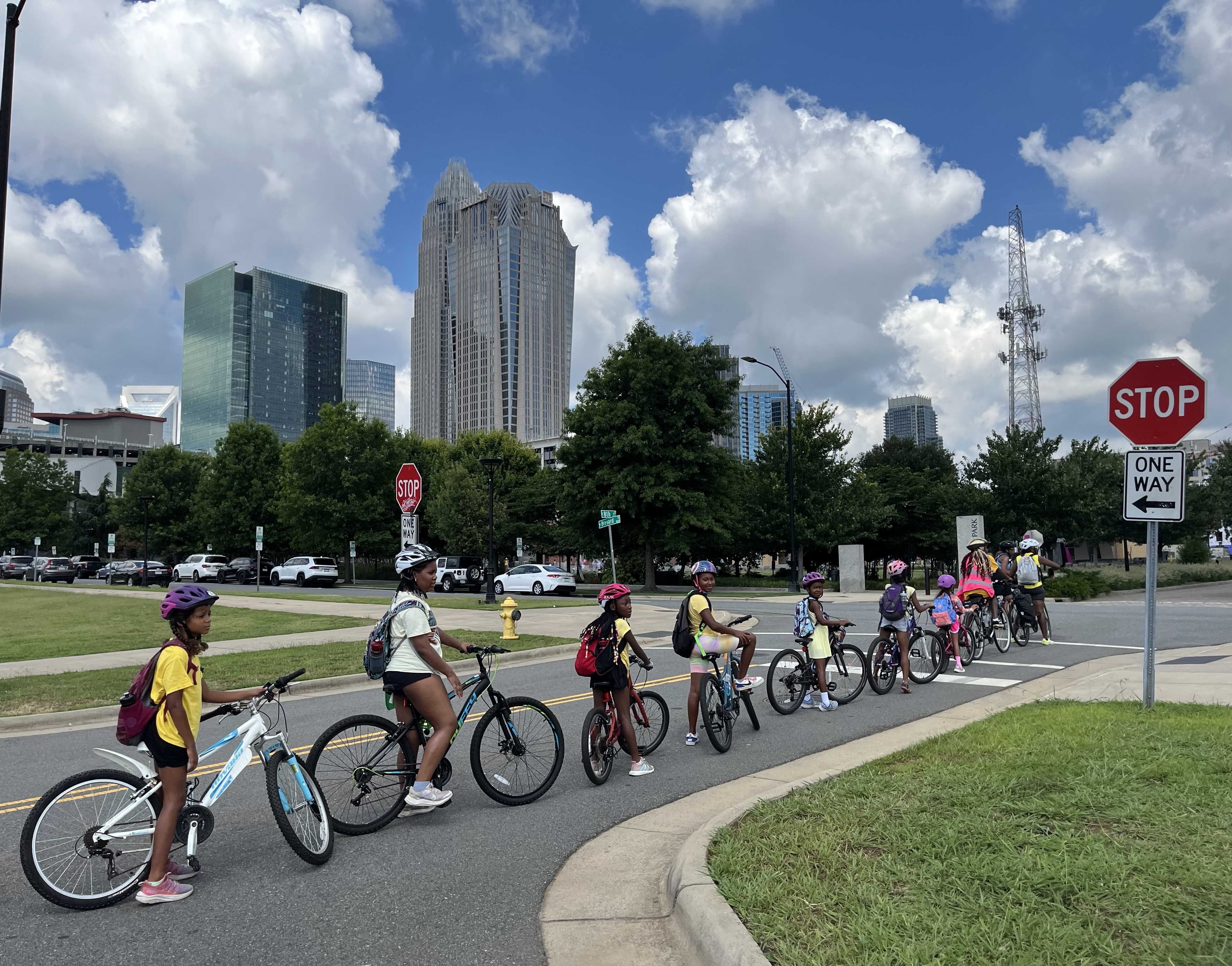 A group of girls part of the Melanin in Motion bike navigate cycling from Plaza Midwood to uptown.