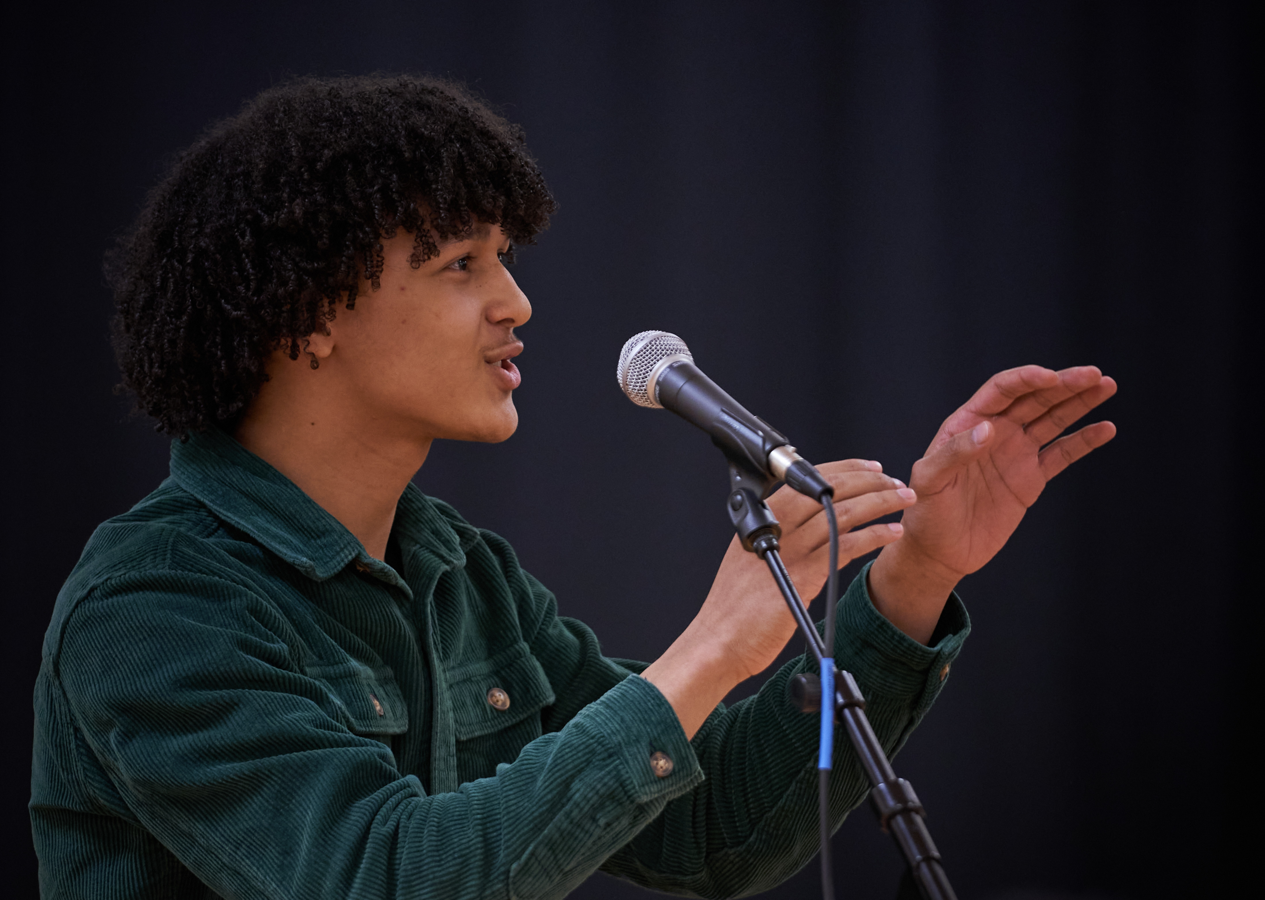 High school senior Richmond Parris competes in the N.C. Poetry Out Loud competition in Charlotte, N.C., on Feb. 24, 2024.