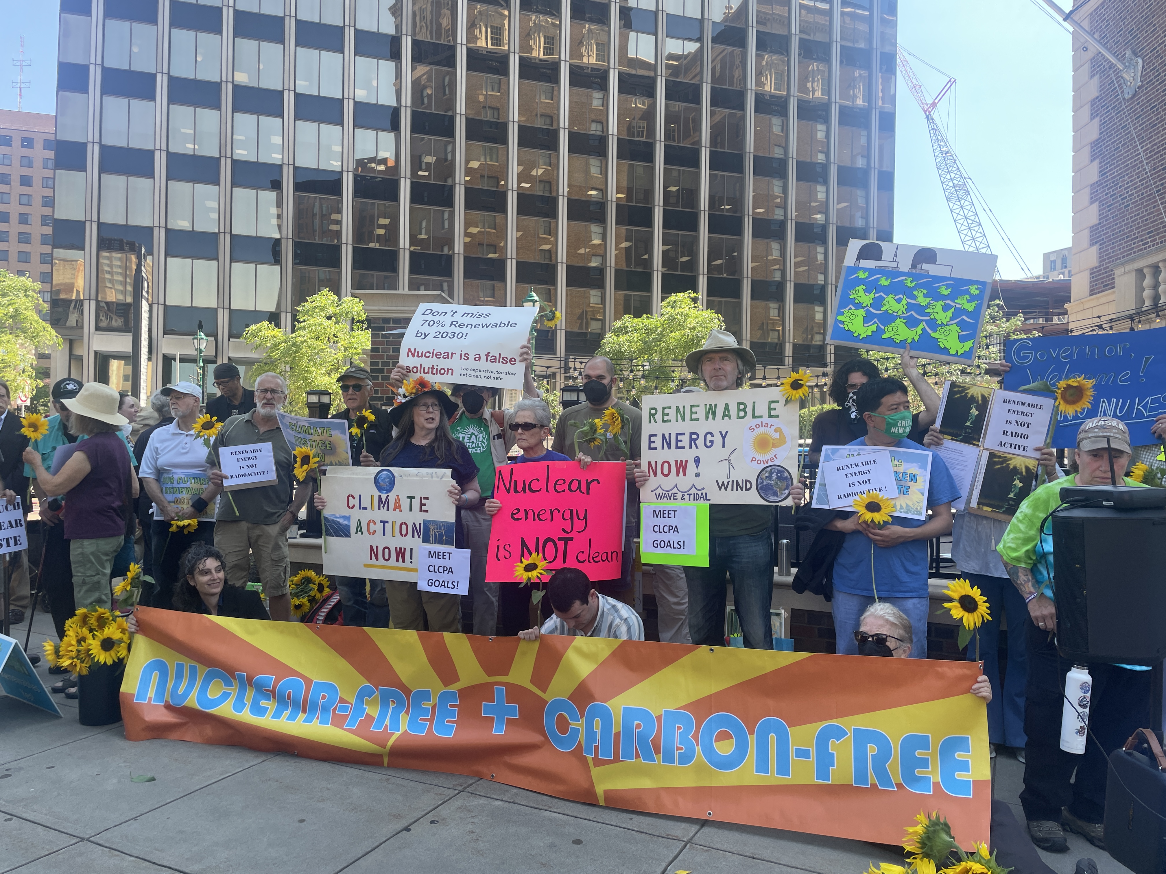 Environmental advocates gather in downtown Syracuse to call on Gov. Kathy Hochul to abandon nuclear energy plans, Sept. 5.