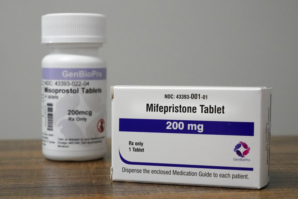 Containers of the medication used to end an early pregnancy sit on a table inside a Planned Parenthood clinic, Oct. 29, 2021, in Fairview Heights, Ill. A report released Thursday, Feb. 24, 2022 says most U.S. abortions are now done with pills rather than surgery. The trend spiked during the pandemic as telemedicine increased and pills by mail were allowed. (AP Photo/Jeff Roberson)