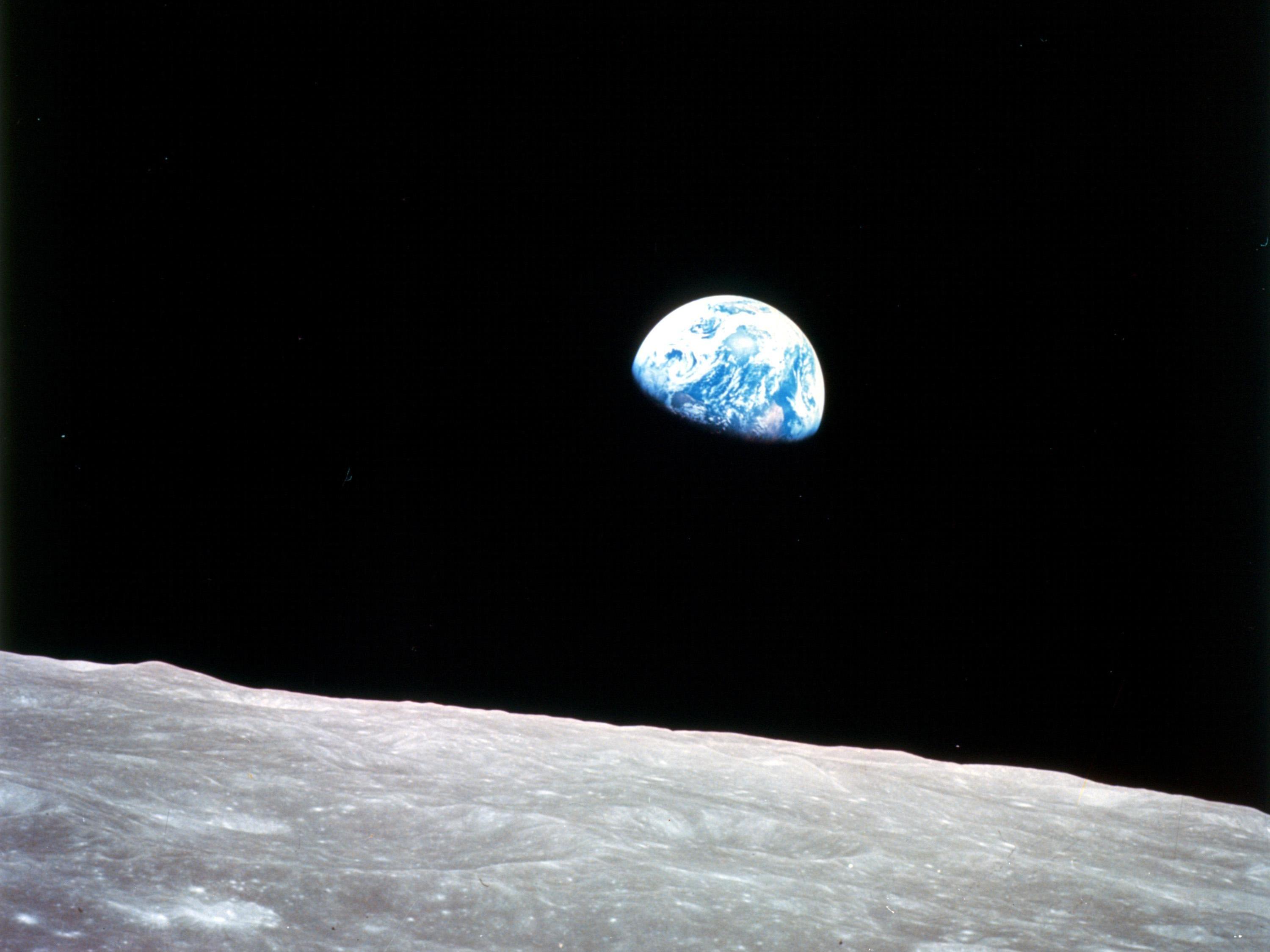  This picture, taken by Apollo 8 astronaut Bill Anders, is one of the most famous images ever photographed in space. It shows the earth rising against the barren lunar landscape on the first human mission to the moon in 1968.