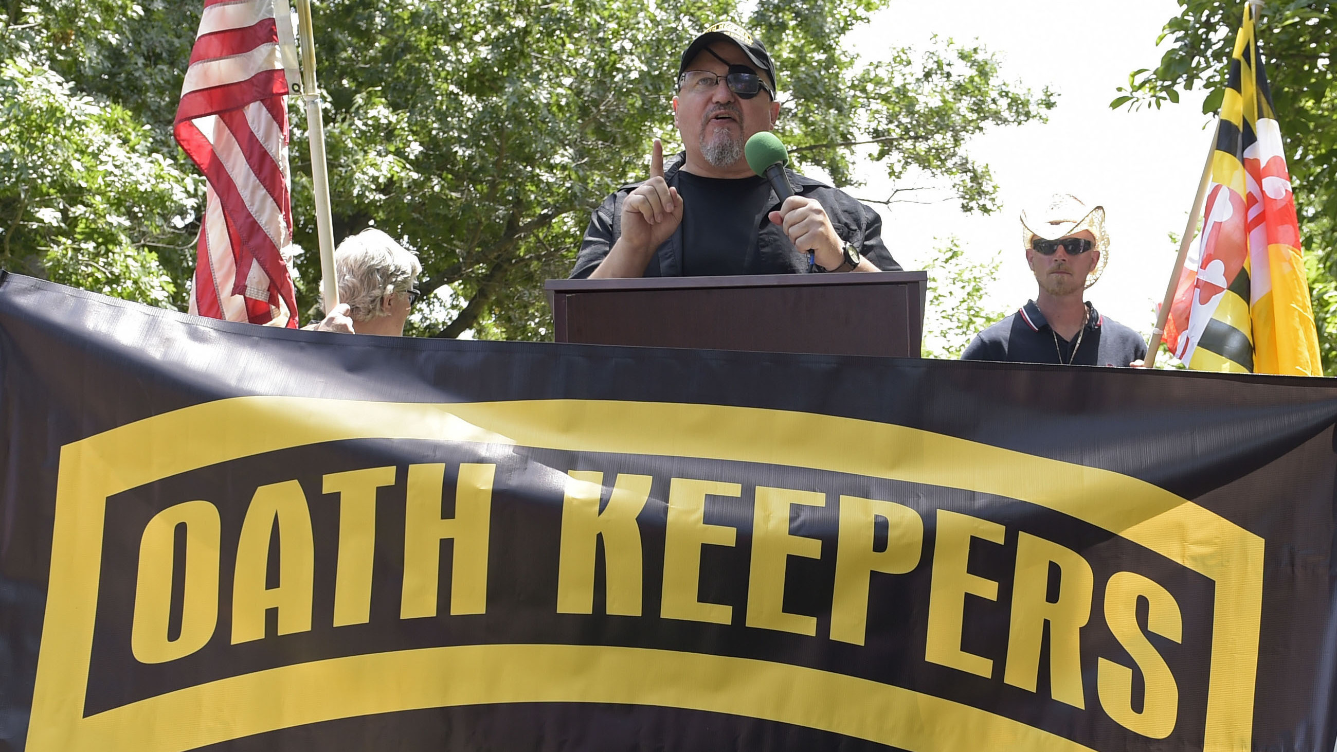 Stewart Rhodes, founder of the Oath Keepers, center, speaks during a rally outside the White House in Washington on June 25, 2017.