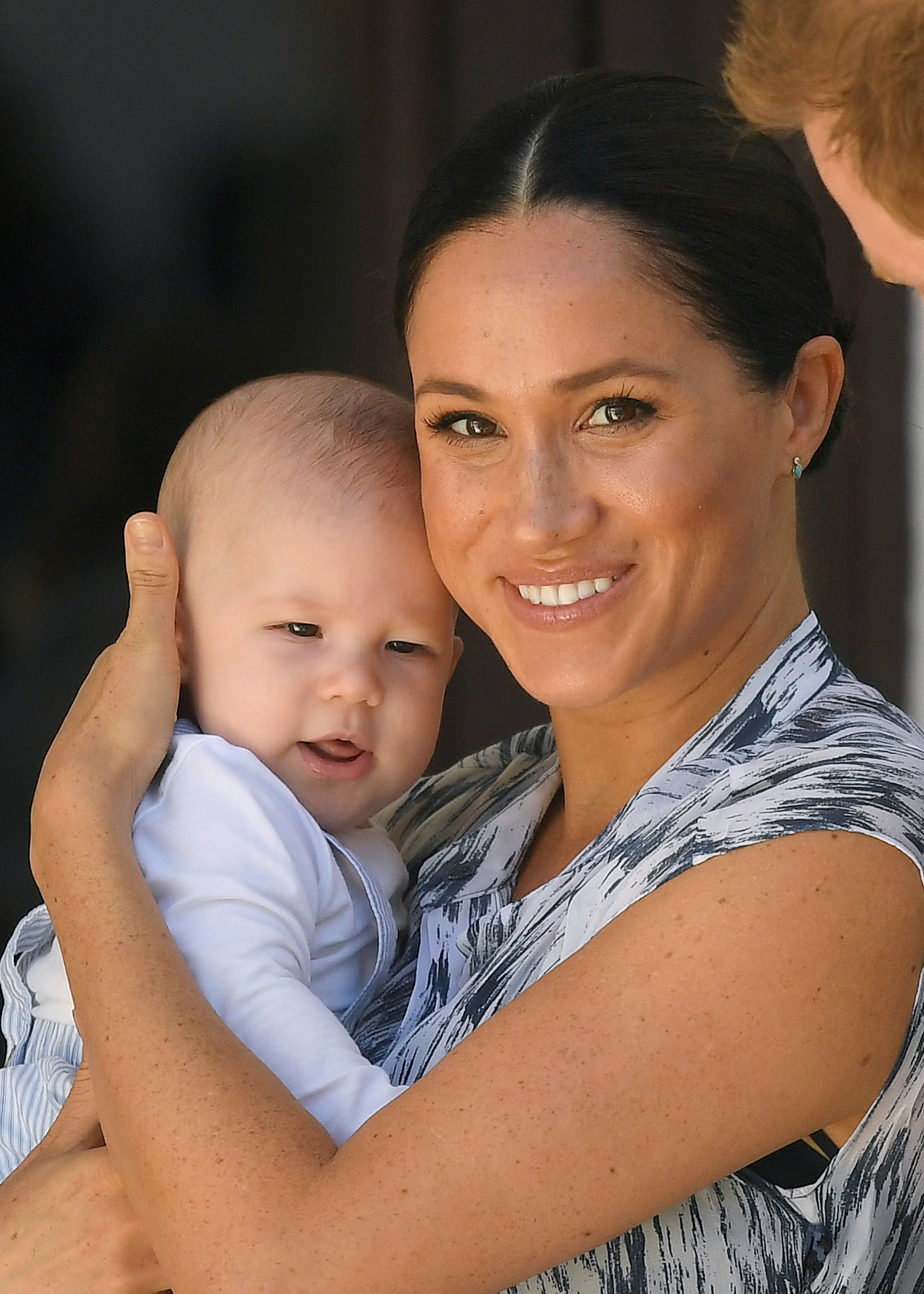 Meghan Markle poses with her son Archie, then a baby.