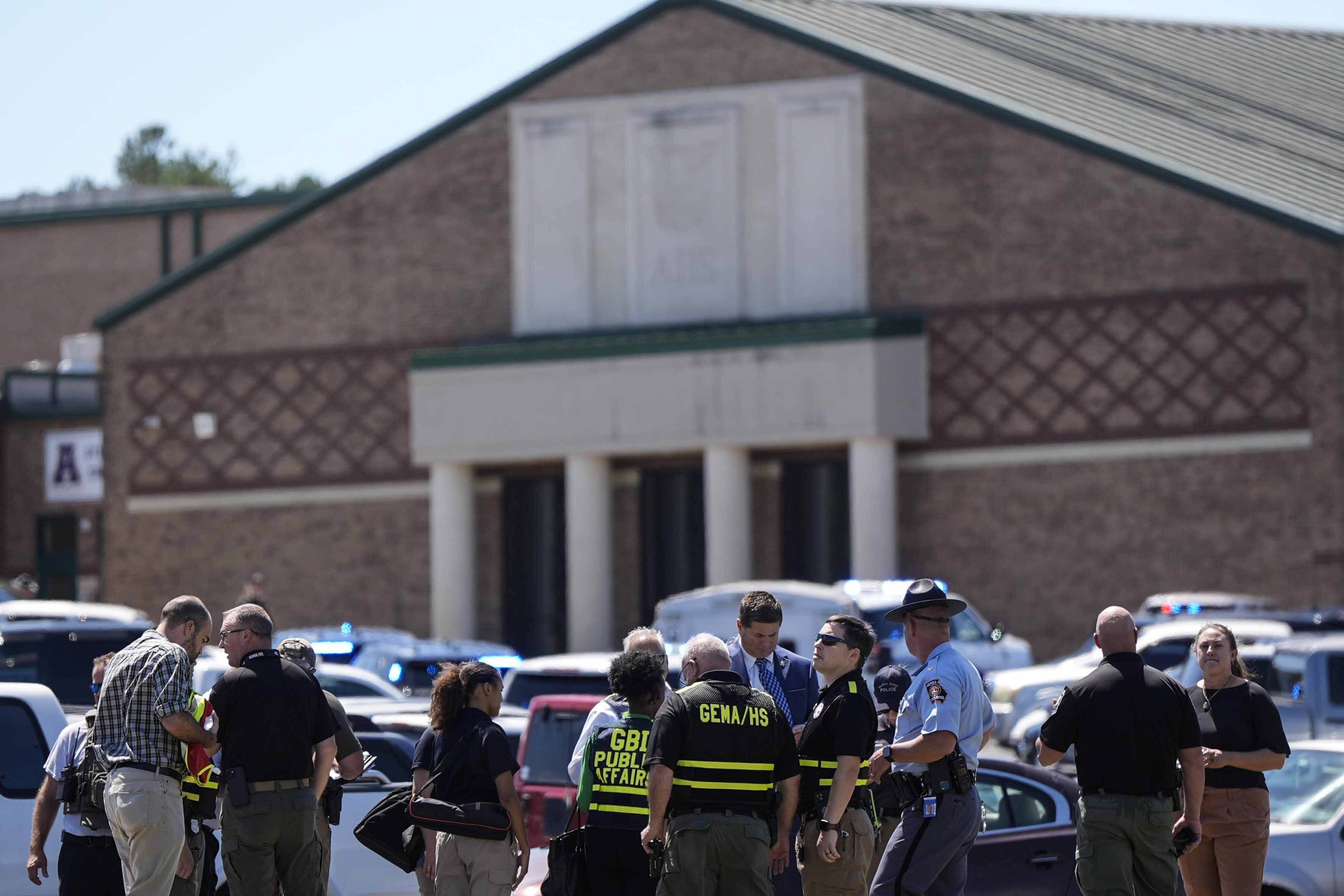 Law enforcement officers and first responders respond to Apalachee High School in Winder, Ga., on Wednesday, after a shooting was reported.