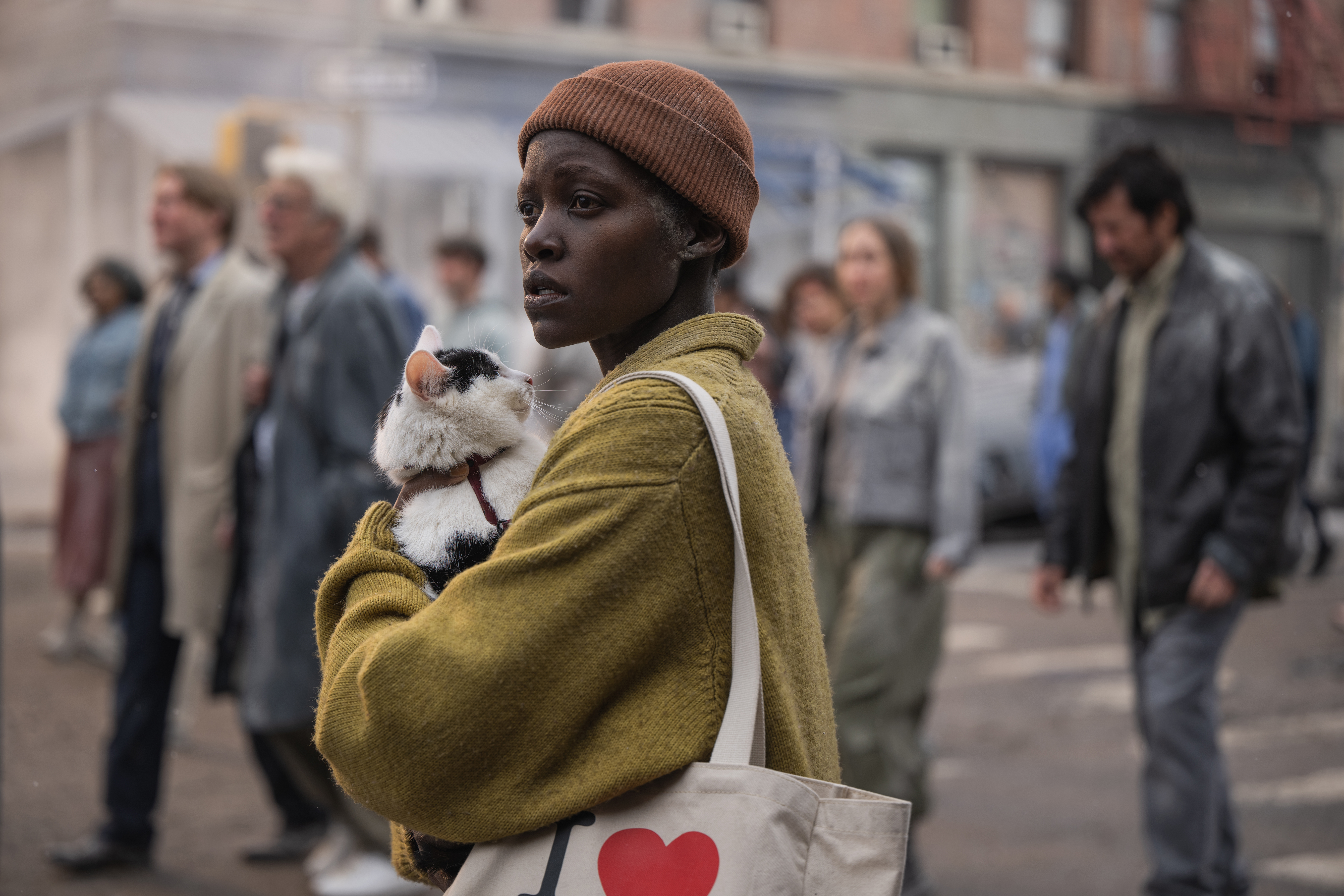 Samira (Lupita Nyong’o) and her cat Frodo try to avoid alien attack in <em>A Quiet Place: Day One.</em>
