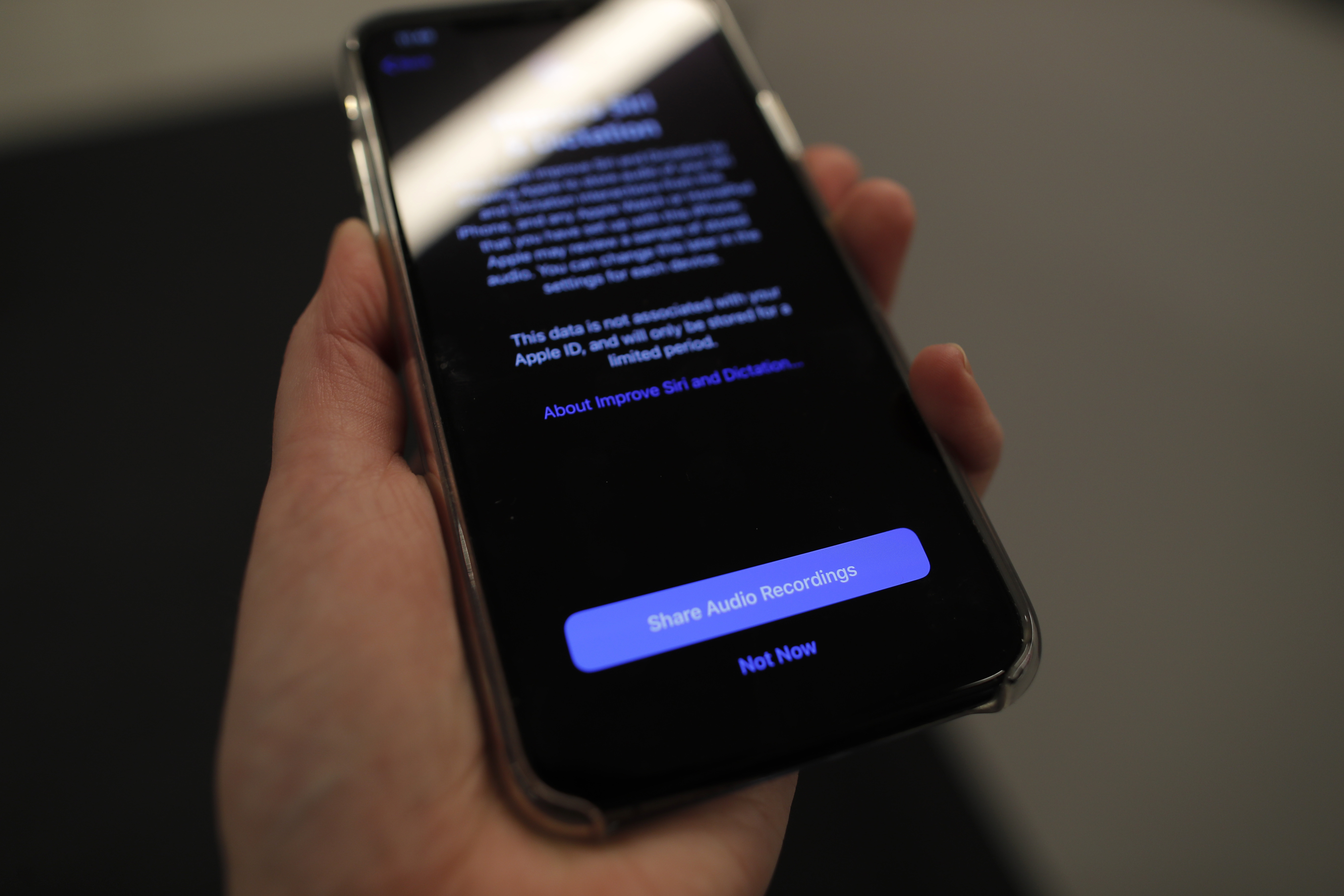 FILE - A screen displays a notice on an iPhone on Tuesday, Oct. 29, 2019, in New York. U.S. communications regulators are requiring that phone companies allow people to text as well as call a new “988” number for the suicide-prevention hotline.