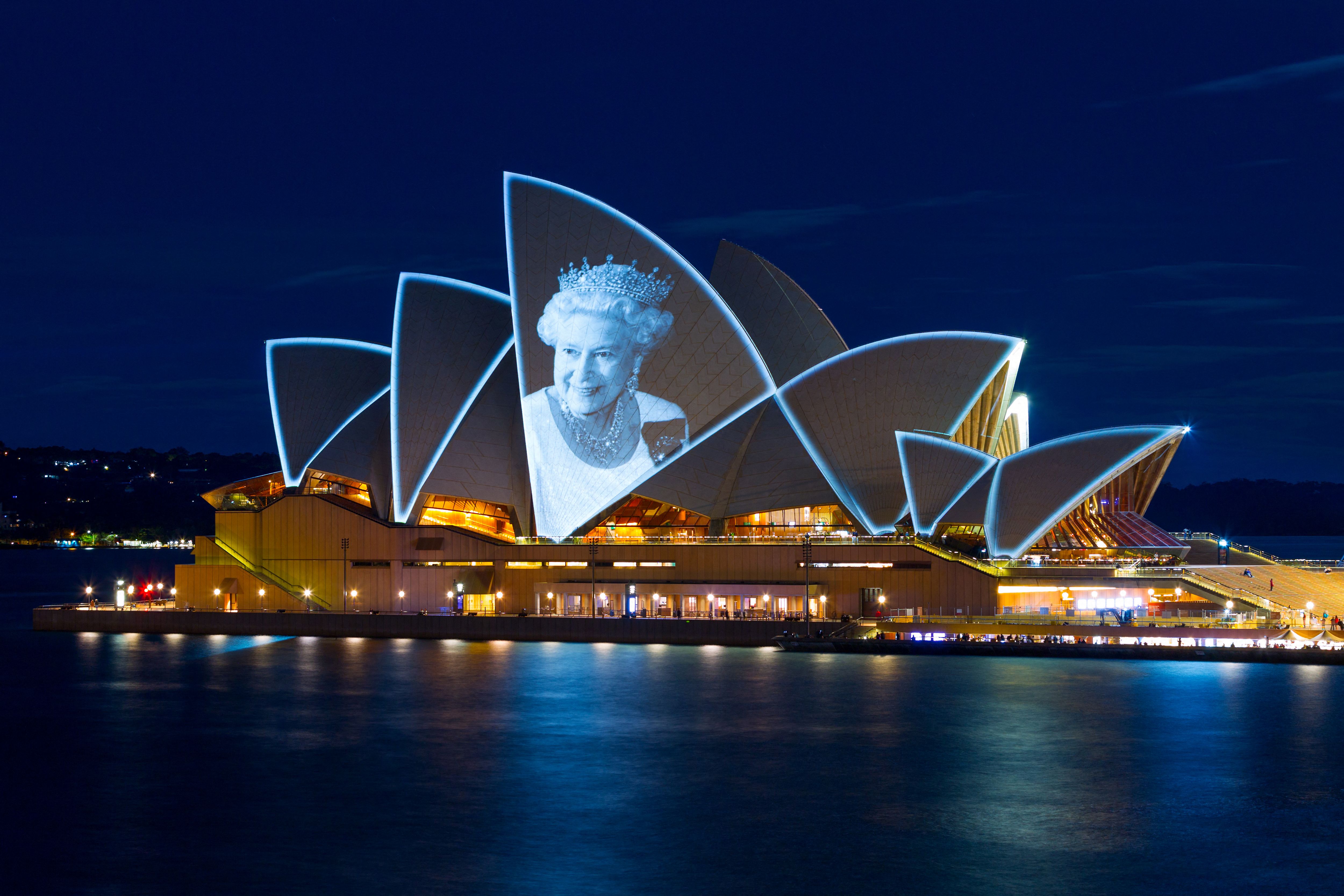 Australia's Sydney Opera House sails are lit up with the picture of Queen Elizebeth II on Sept. 9, 2022, in Sydney.  