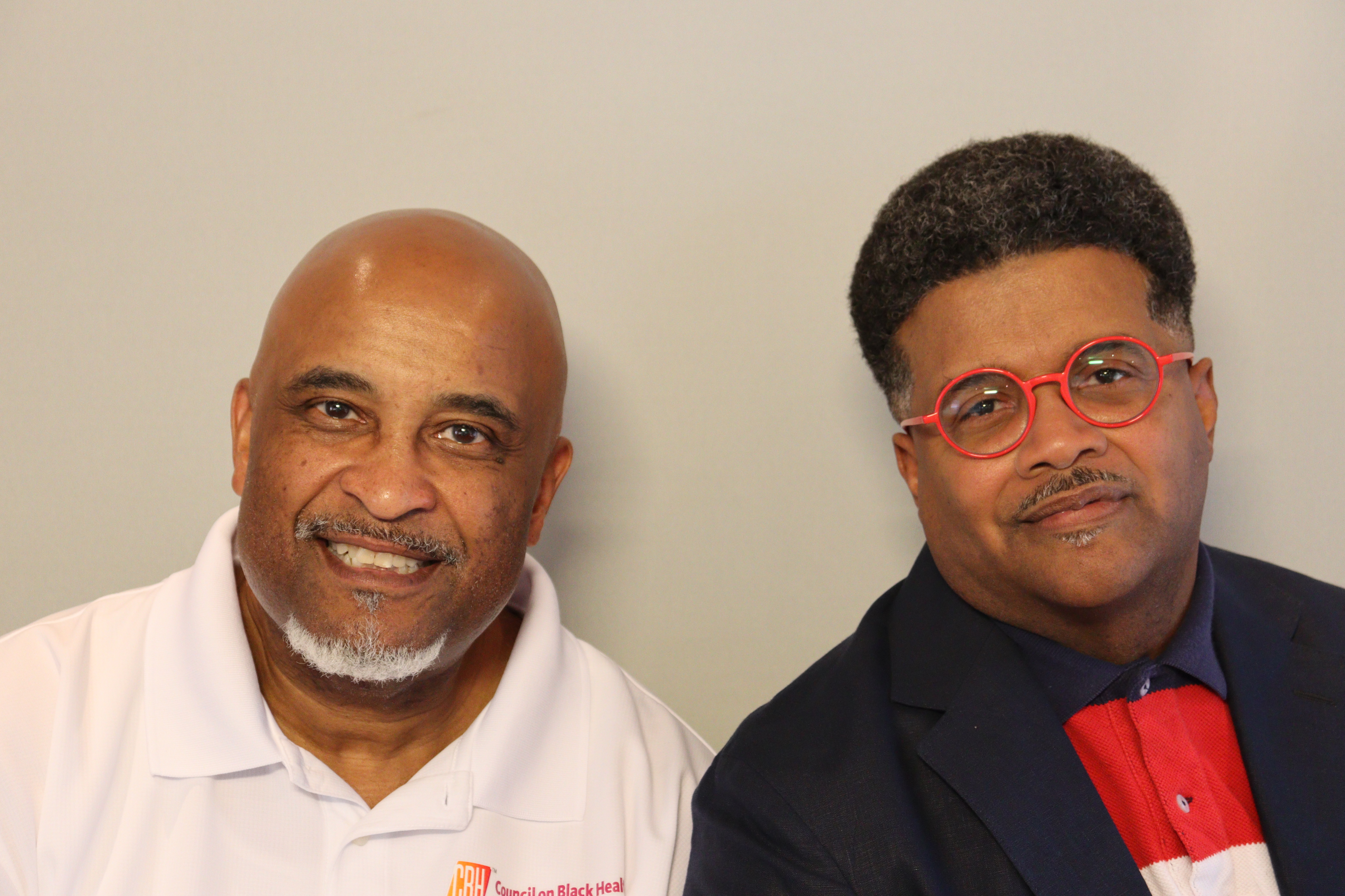 Arthur "AJ" Johns, left, and Bishop Wade Ferguson shared a conversation in the StoryCorps mobile recording booth in uptown Charlotte.