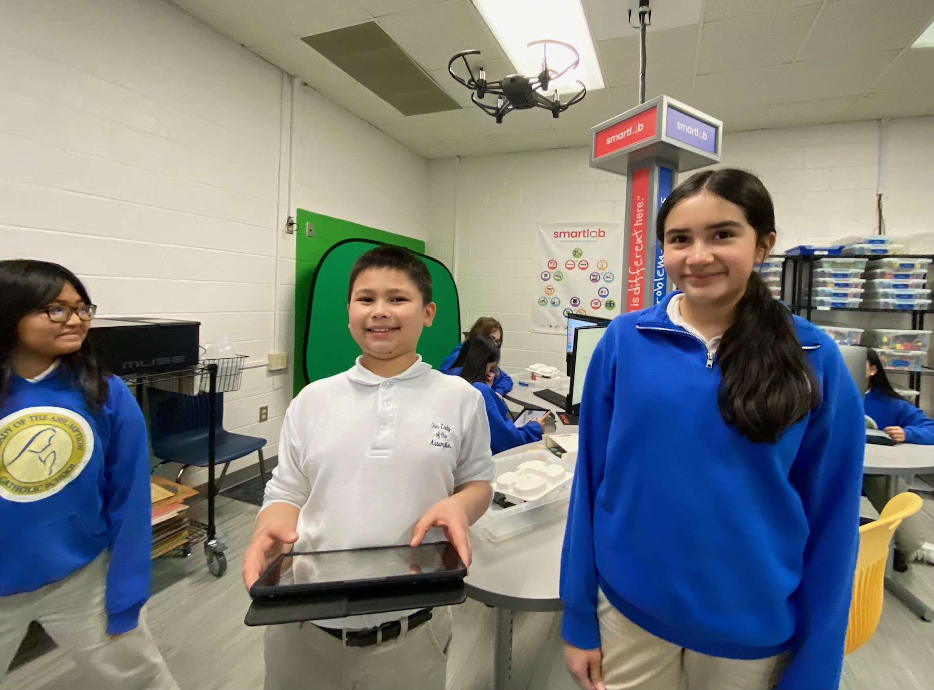 Students fly a drone in the technology lab at Our Lady of the Assumption, a Catholic school in Charlotte that has Opportunity Scholarship students.