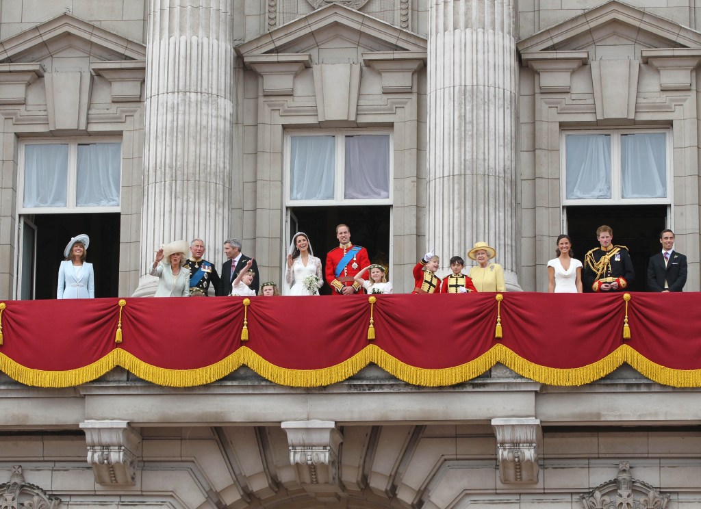 Queen Elizabeth looks on with members of her family after the wedding of Prince William and Kate Middleton. 