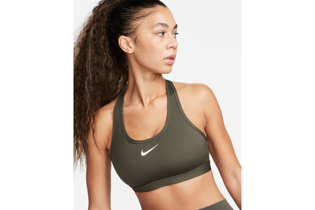 Woman wearing a Nike padded sports garment.