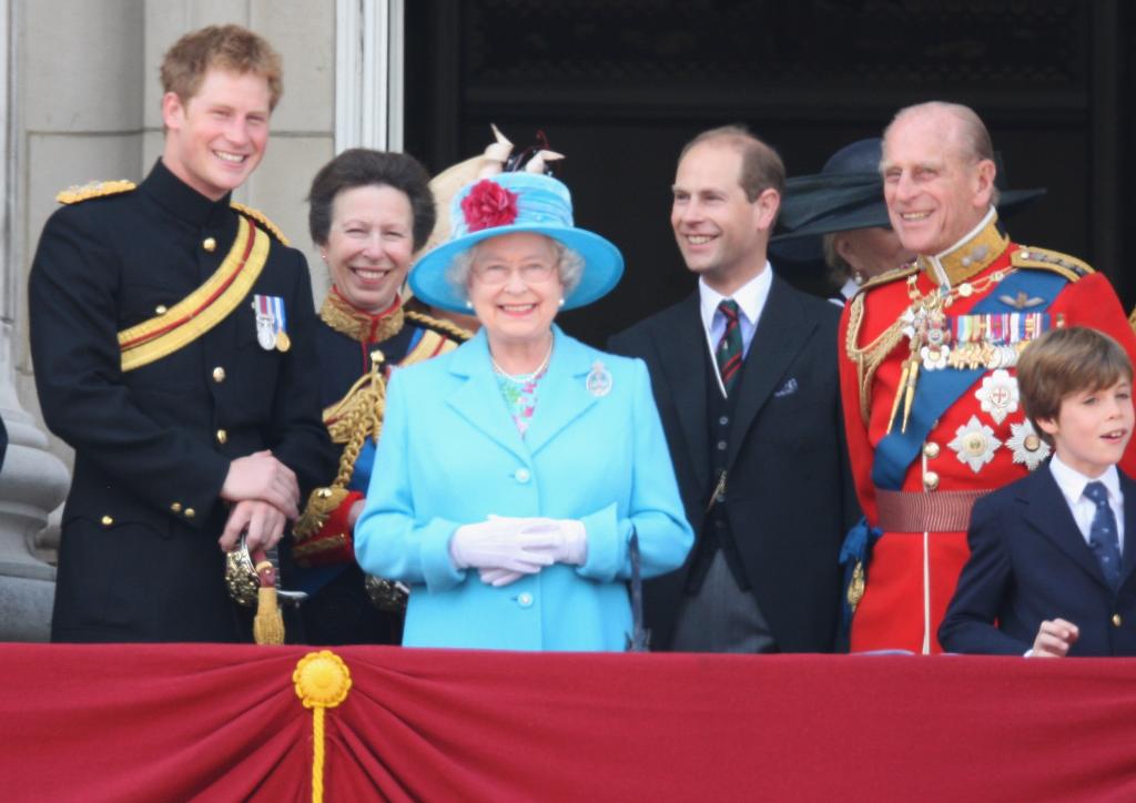 LONDON, ENGLAND - JUNE 13:  TRH Prince Harry, Princess Anne, Princess Royal, Prince Edward, Earl of Wessex, Sophie, Countess of Wessex, HM Queen Elizabeth II and HRH Prince Philip, Duke of Edinburgh, laugh before watching a fly-past over Buckingham Palace after the Trooping the Colour ceremony on June 13, 2009 in London, England. The ceremony of Trooping the Colour is believed to have first been performed during the reign of King Charles II. In 1748, it was decided that the parade would be used to mark the official birthday of the Sovereign. More than 600 guardsmen and cavalry make up the parade, a celebration of the Sovereign's official birthday, although the Queen's actual birthday is on 21 April.  (Photo by Chris Jackson/Getty Images)