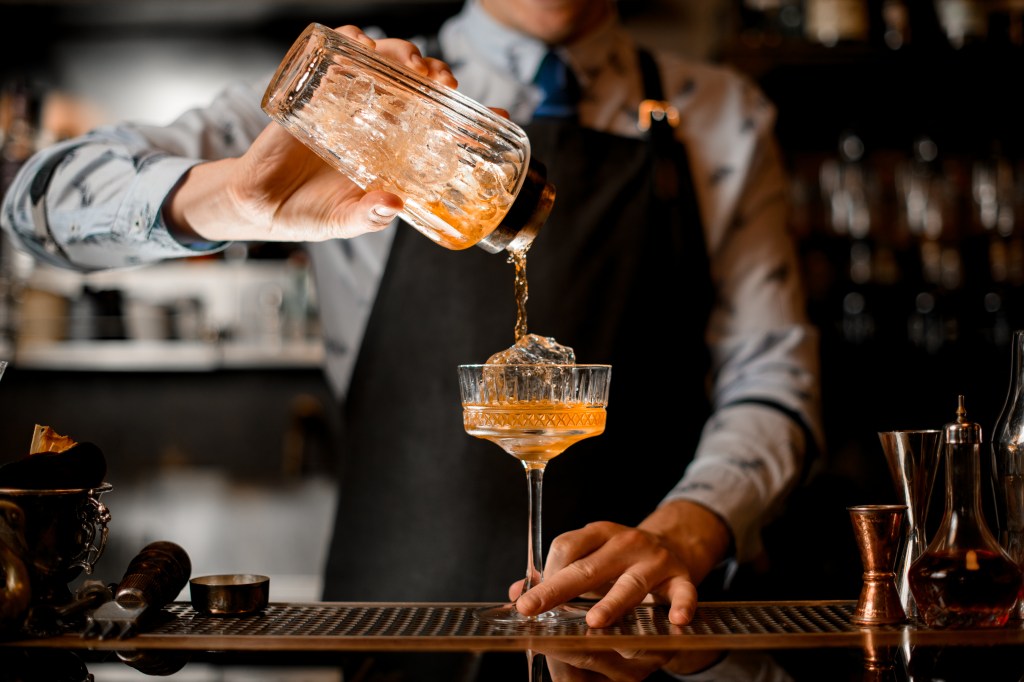 Man pouring cocktail