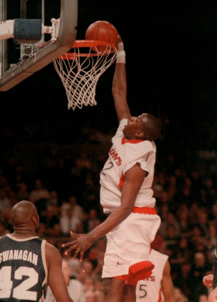 Tyrone Grant slam dunks against Notre Dame at MSG in 1999. 