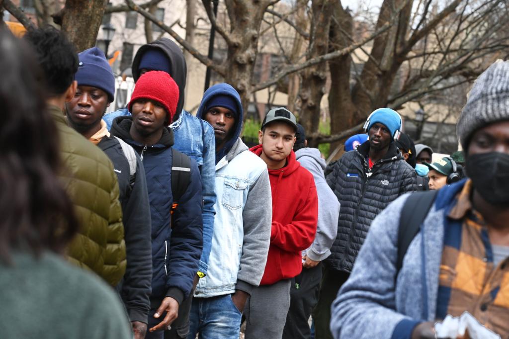 New York- Migrants get free food outside Tompkins Square Park