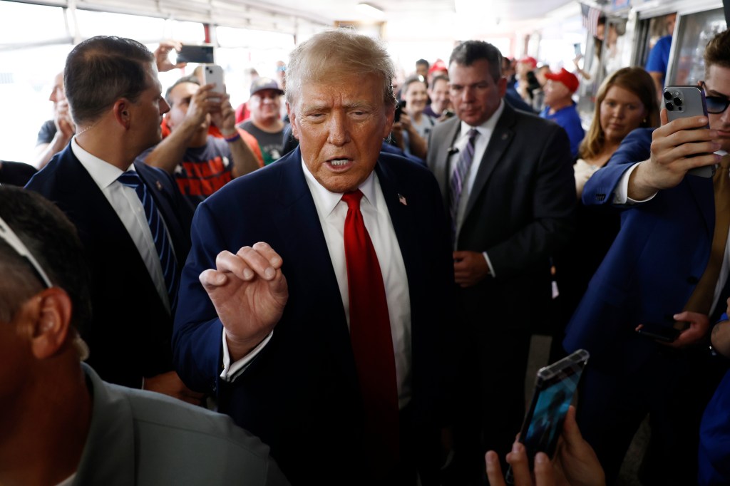 Donald Trump greets supporters at sandwich stop Tony and Nick's steaks on June 22, 2024 in Philadelphia, Pennsylvania. 