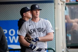 New York Yankees third baseman DJ LeMahieu stands in the dugout before the team's baseball game against the Los Angeles Angels, Tuesday, May 28, 2024, in Anaheim, Calif.