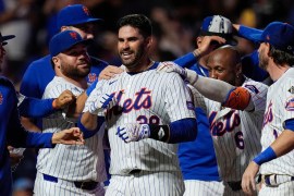New York Mets' J.D. Martinez (28) celebrates with teammates after his game-winning, two-run home run against the Miami Marlins during the ninth inning of a baseball game Thursday, June 13, 2024, in New York. The Mets won 3-2.