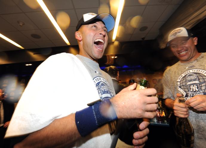 Yankees Derek Jeter celebrating in the locker room after the Yankees won the World Series.