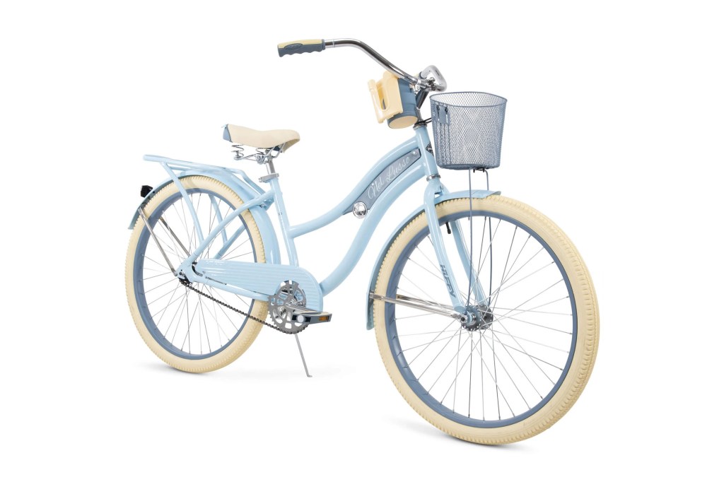 A blue and white bicycle with a basket