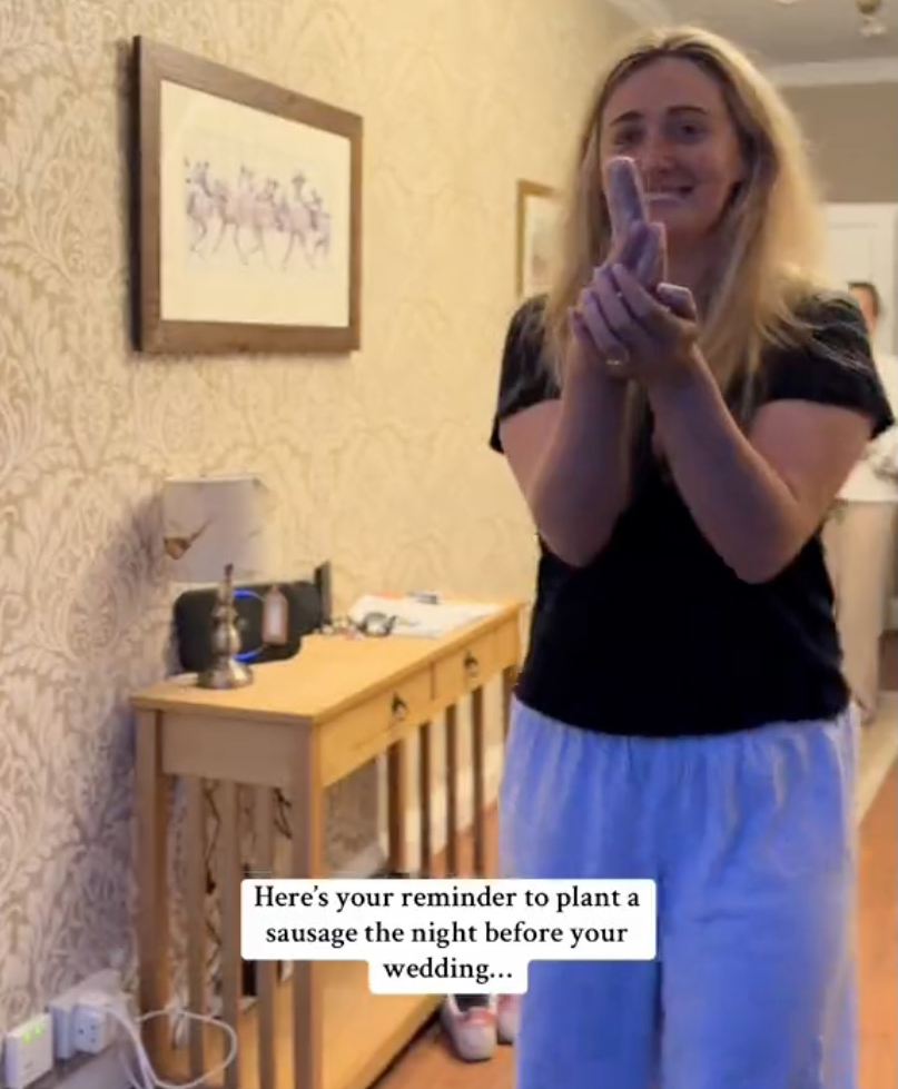 A woman burying a sausage on the night before her wedding as a tradition to keep the rain away