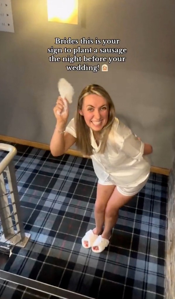 Scottish bride Lauren holding a sausage. 