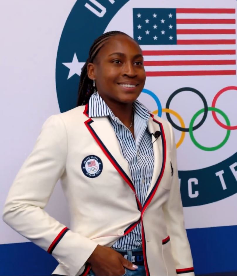 Coco Gauff models the jacket she'll wear during the 2024 Olympics Opening Ceremony.