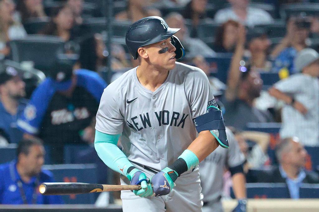 New York Yankees outfielder Aaron Judge #99 hits a two-run home run in the 6th inning.