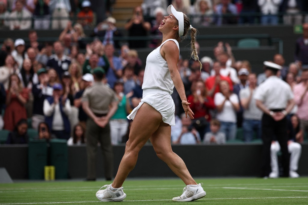 Kazakhstan's Yulia Putintseva celebrates winning against Poland's Iga Swiatek during their women's singles tennis match on the sixth day.