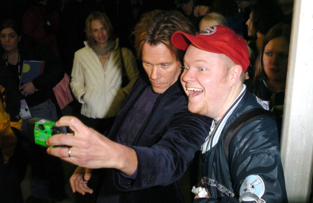 Kevin Bacon, director, interacting with a fan at the 2005 Sundance Film Festival 'Loverboy' Premiere in Park City, Utah.