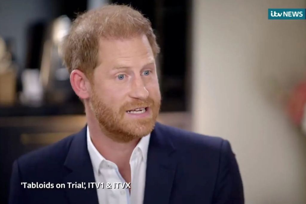 Prince Harry, Duke of Sussex with red hair and beard, in a suit discussing the breakdown of his relationship with the royal family