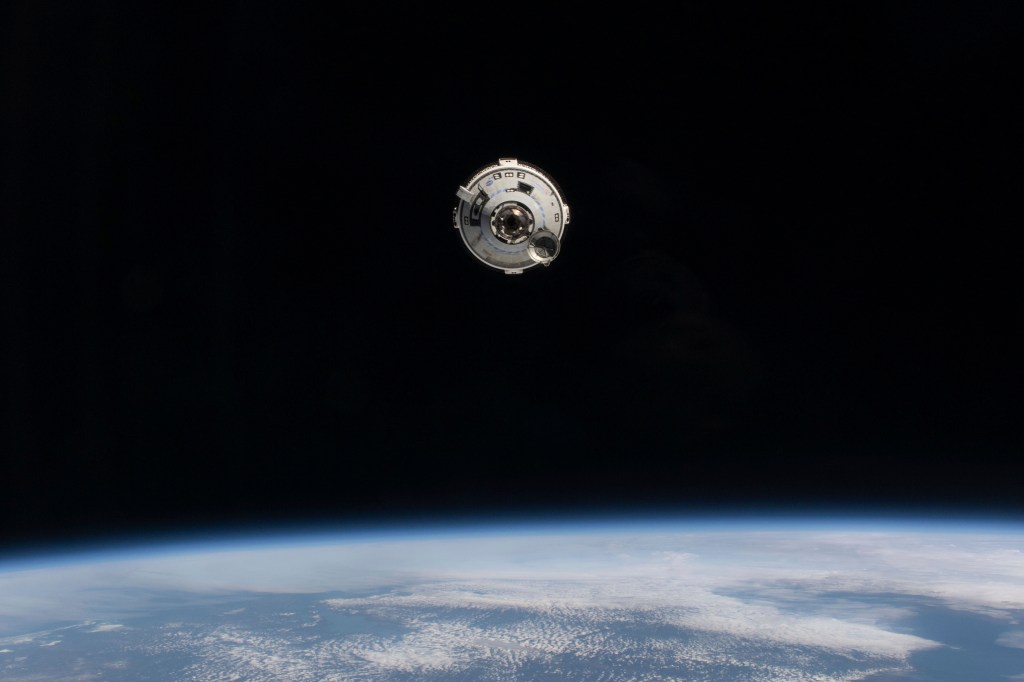 In this photo provided by NASA, the Boeing Starliner spacecraft with astronauts Butch Wilmore and Suni Williams aboard approaches the International Space Station on Thursday, June 6, 2024.