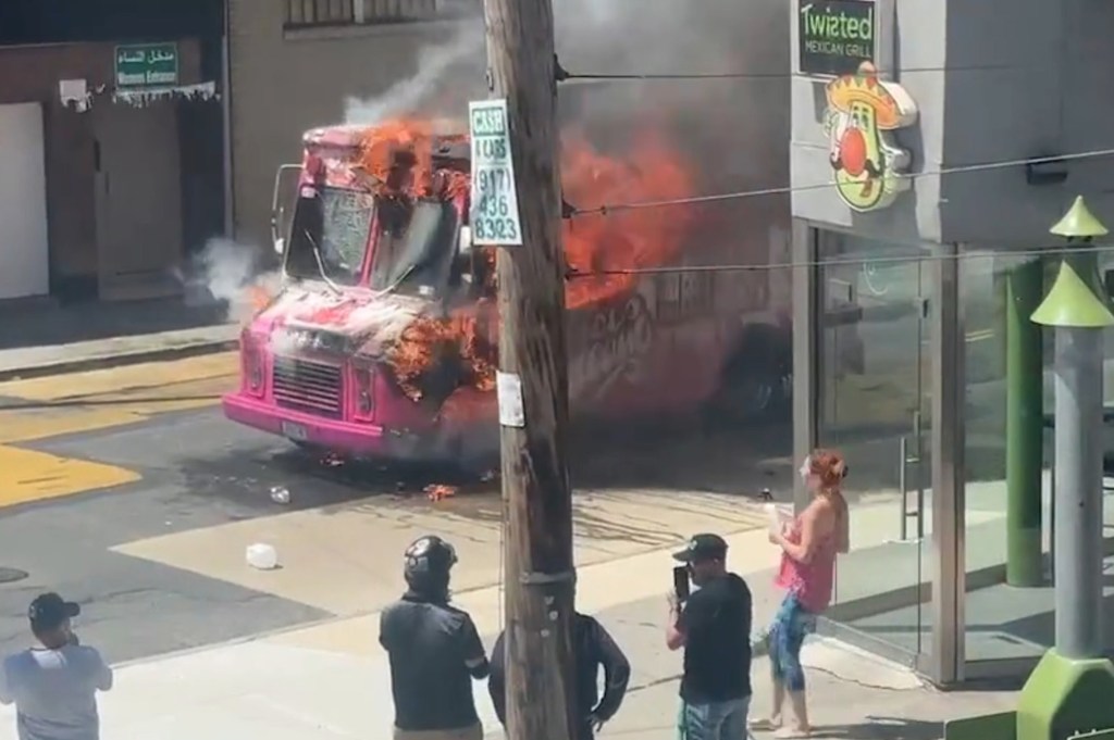 Screengrab from a video showing a New York Ice Cream truck engulfed in flames