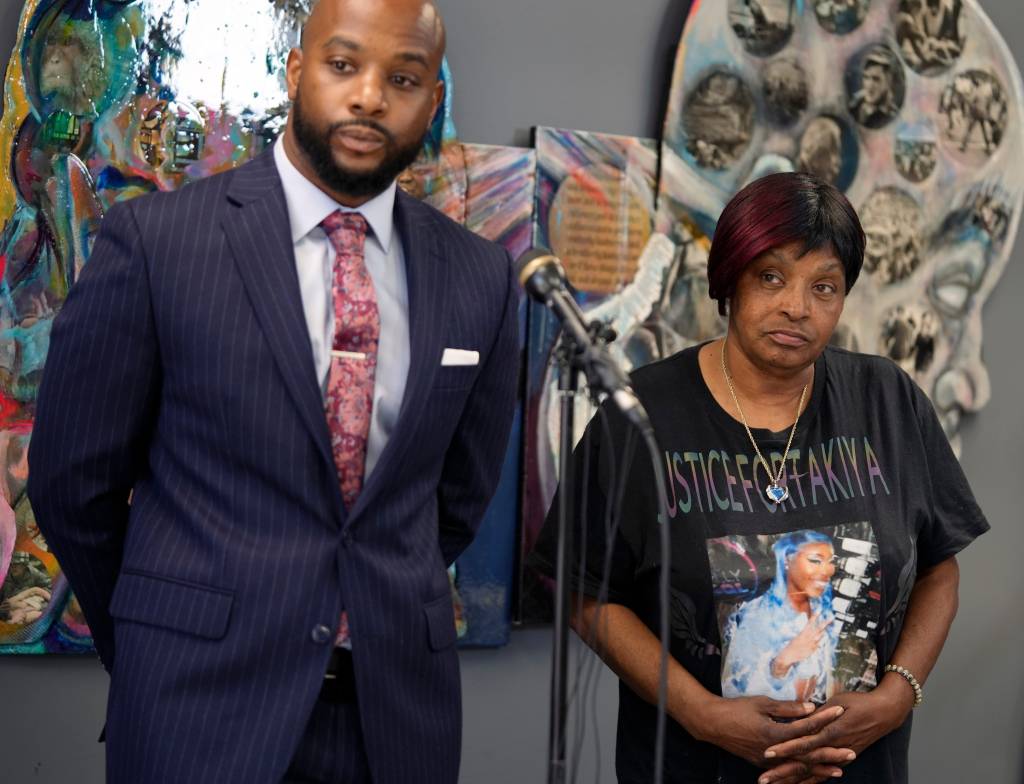 Attorney Sean Walton and Nadine Young, grandmother of Ta'Kiya Young, speak during a press conference following the indictment of Blendon Twp. officer Connor Grubb.   