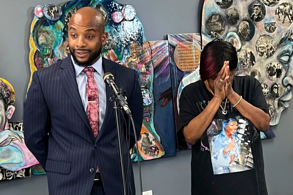 Attorney Sean Walton and Ta’Kiya Young's grandmother Nadine Young react after an Ohio police officer was indicted on charges including murder in the shooting of Ta’Kiya Young on Tuesday, Aug. 13, 2024 in Columbus, Ohio. 