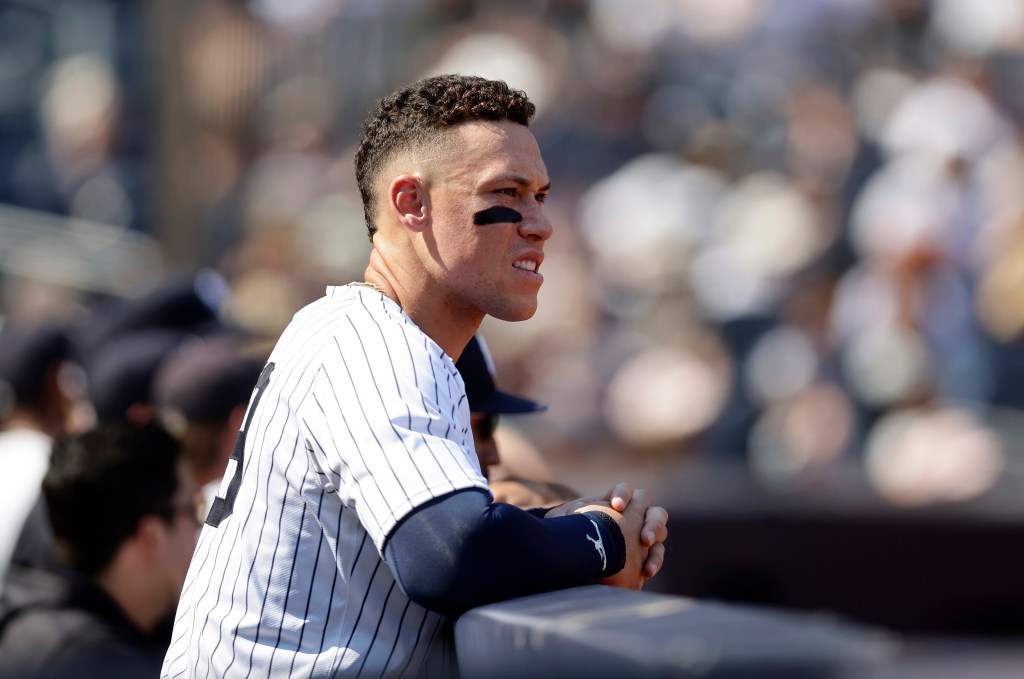 Aaron Judge #99 of the New York Yankees looking on during the fourth inning against the Boston Red Sox at Yankee Stadium